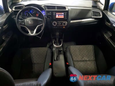 Zdjęcie 8 z 11 samochodu: 2016 HONDA FIT LX VIN:JHMGK5H5XGX032640 - miniatura