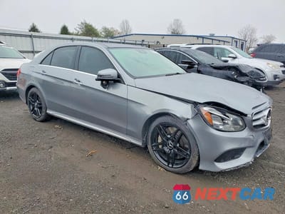 Czwarte zdjęcie samochodu z boku: 2014 MERCEDES-BENZ E 550 4MATIC VIN:WDDHF9BB1EA790386 - miniatura