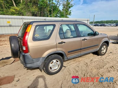 Trzecie zdjęcie samochodu z tyłu: 2002 HONDA CR-V LX VIN:SHSRD684X2U001207 - miniatura