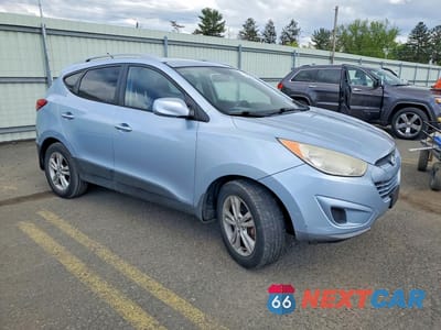 Czwarte zdjęcie samochodu z boku: 2010 HYUNDAI TUCSON GLS VIN:KM8JUCAC0AU076536 - miniatura