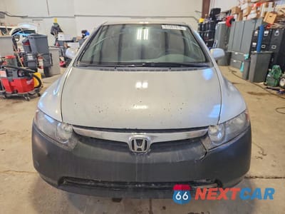 Piąte zdjęcie samochodu w środku: 2007 HONDA CIVIC LX VIN:2HGFA16527H013565 - miniatura