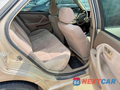 Zdjęcie 6 z 12 samochodu: 1999 TOYOTA CAMRY LE VIN:4T1BG22KXXU896076 - miniatura