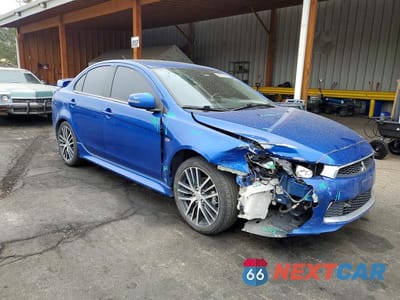 Czwarte zdjęcie samochodu z boku: 2017 MITSUBISHI LANCER ES VIN:JA32V2FW2HU001302 - miniatura