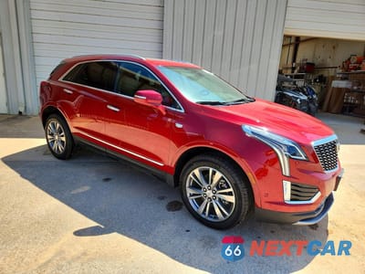 Czwarte zdjęcie samochodu z boku: 2021 CADILLAC XT5 PREMIUM LUXURY VIN:1GYKNDRS3MZ229810 - miniatura