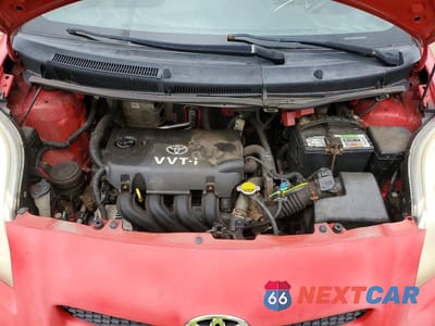 Zdjęcie 11 z 12 samochodu: 2009 TOYOTA YARIS BASE VIN:JTDJT903795238504 - miniatura