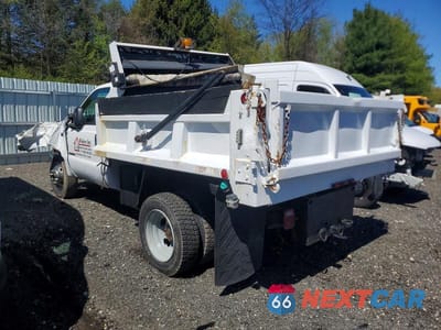 Trzecie zdjęcie samochodu z tyłu: 2001 FORD F450 SUPER DUTY DUMP TRUCK VIN:1FDXF47F31ED15583 - miniatura