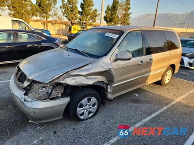 2004 KIA SEDONA LX KNDUP131746602825 - główne zdjęcie licytacji z USA - miniatura