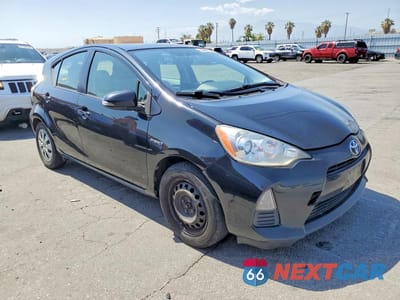Czwarte zdjęcie samochodu z boku: 2012 TOYOTA PRIUS C ONE VIN:JTDKDTB30C1515780 - miniatura