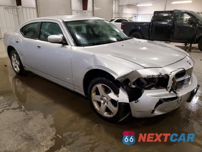 Czwarte zdjęcie samochodu z boku: 2010 DODGE CHARGER VIN:2B3CK4CVXAH274200 - miniatura