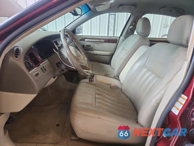 Zdjęcie 7 z 12 samochodu: 2004 LINCOLN TOWN CAR EXECUTIVE VIN:1LNHM81W54Y644024 - miniatura
