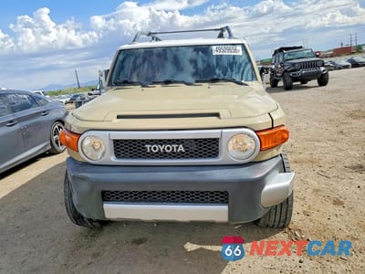 Piąte zdjęcie samochodu w środku: 2011 TOYOTA FJ CRUISER BASE VIN:JTEBU4BF0BK104156 - miniatura