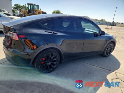 Trzecie zdjęcie samochodu z tyłu: 2021 TESLA MODEL Y VIN:5YJYGDEE2MF080080 - miniatura