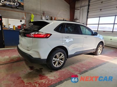 Trzecie zdjęcie samochodu z tyłu: 2023 FORD EDGE SEL VIN:2FMPK4J96PBA13773 - miniatura