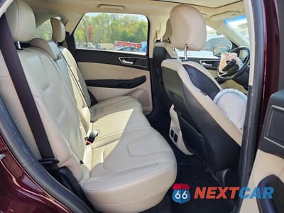Zdjęcie 11 z 13 samochodu: 2019 FORD EDGE TITANIUM VIN:2FMPK4K99KBC14025 - miniatura