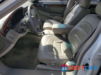 Zdjęcie 7 z 12 samochodu: 2000 CADILLAC DEVILLE VIN:1G6KD54Y0YU355221 - miniatura