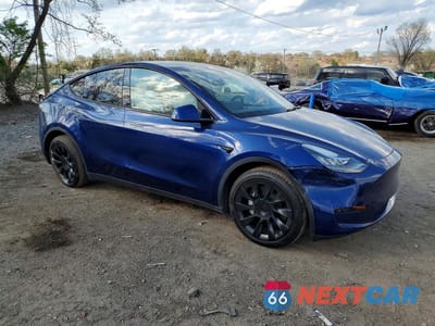 Czwarte zdjęcie samochodu z boku: 2023 TESLA MODEL Y VIN:7SAYGDEE3PA135169 - miniatura