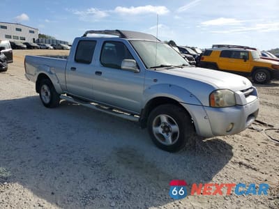 Czwarte zdjęcie samochodu z boku: 2002 NISSAN FRONTIER XE-V6 VIN:1N6ED29X02C333108 - miniatura