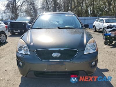 Piąte zdjęcie samochodu w środku: 2012 KIA RONDO VIN:KNAHH8A82C7383740 - miniatura