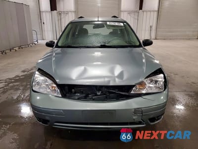 Piąte zdjęcie samochodu w środku: 2005 FORD FOCUS ZXW VIN:1FAFP36N35W179347 - miniatura