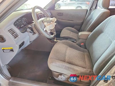 Zdjęcie 7 z 12 samochodu: 2004 KIA OPTIMA LX VIN:KNAGD126745362696 - miniatura
