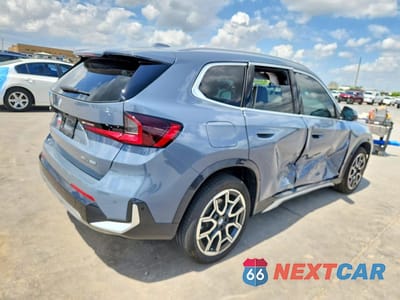 Trzecie zdjęcie samochodu z tyłu: 2026 BMW X1 XDRIVE28I VIN:WBX73EF0XT5427805 - miniatura