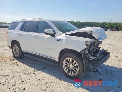 Czwarte zdjęcie samochodu z boku: 2022 GMC YUKON SLT VIN:1GKS1BKD9NR209908 - miniatura