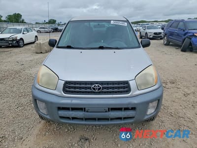 Piąte zdjęcie samochodu w środku: 2001 TOYOTA RAV4 BASE VIN:JTEGH20V610033516 - miniatura