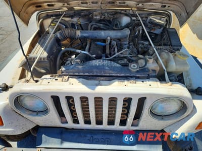 Zdjęcie 12 z 12 samochodu: 2004 JEEP WRANGLER / TJ SPORT VIN:1J4F449S34P802463 - miniatura