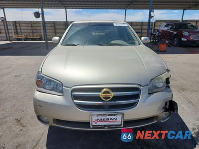 Piąte zdjęcie samochodu w środku: 2003 NISSAN MAXIMA GXE VIN:JN1DA31A23T410487 - miniatura