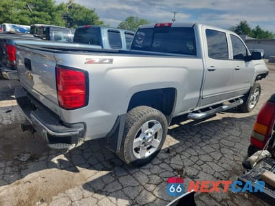 Trzecie zdjęcie samochodu z tyłu: 2016 CHEVROLET SILVERADO K2500 HEAVY DUTY LT VIN:1GC1KVEG7GF279861 - miniatura