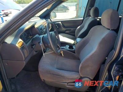 Zdjęcie 7 z 12 samochodu: 2000 JEEP GRAND CHEROKEE LAREDO VIN:1J4GW48S0YC187528 - miniatura