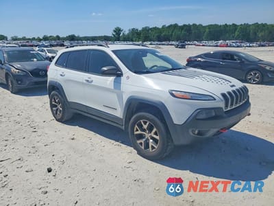 Czwarte zdjęcie samochodu z boku: 2014 JEEP CHEROKEE TRAILHAWK VIN:1C4PJMBB3EW243470 - miniatura