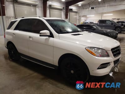 Czwarte zdjęcie samochodu z boku: 2015 MERCEDES-BENZ ML 350 4MATIC VIN:4JGDA5HBXFA511358 - miniatura