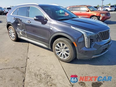 Czwarte zdjęcie samochodu z boku: 2023 CADILLAC XT4 PREMIUM LUXURY VIN:1GYFZCR45PF170041 - miniatura