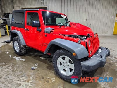 Czwarte zdjęcie samochodu z boku: 2016 JEEP WRANGLER SPORT VIN:1C4AJWAG0GL128389 - miniatura