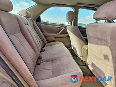 Zdjęcie 10 z 12 samochodu: 1999 TOYOTA CAMRY LE VIN:JT2BG28K2X0343353 - miniatura