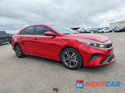 Czwarte zdjęcie samochodu z boku: 2022 KIA FORTE LXS VIN:3KPF24ADXNE443204 - miniatura