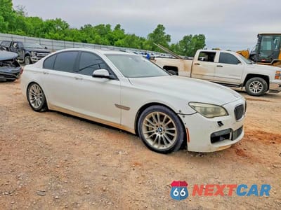 Czwarte zdjęcie samochodu z boku: 2015 BMW 750 I VIN:WBAYA8C56FD825805 - miniatura