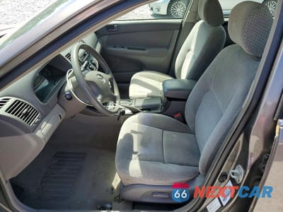 Zdjęcie 7 z 11 samochodu: 2003 TOYOTA CAMRY LE VIN:4T1BE32K13U704985 - miniatura