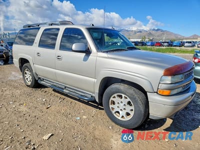 Czwarte zdjęcie samochodu z boku: 2005 CHEVROLET SUBURBAN K1500 VIN:3GNFK16ZX5G129003 - miniatura
