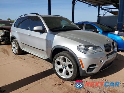 Czwarte zdjęcie samochodu z boku: 2013 BMW X5 XDRIVE35I VIN:5UXZV4C59D0E02713 - miniatura
