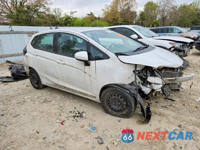 Czwarte zdjęcie samochodu z boku: 2018 HONDA FIT LX VIN:3HGGK5H4XJM735825 - miniatura