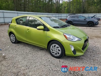 Czwarte zdjęcie samochodu z boku: 2016 TOYOTA PRIUS C TWO VIN:JTDKDTB32G1117542 - miniatura