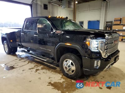 Czwarte zdjęcie samochodu z boku: 2023 GMC SIERRA K3500 DENALI VIN:1GT49WEYXPF166963 - miniatura