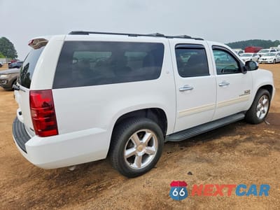 Trzecie zdjęcie samochodu z tyłu: 2011 CHEVROLET SUBURBAN C1500 LT VIN:1GNSCJE02BR283540 - miniatura