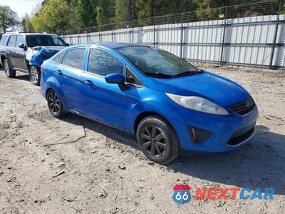 Czwarte zdjęcie samochodu z boku: 2011 FORD FIESTA SE VIN:3FADP4BJ7BM159422 - miniatura