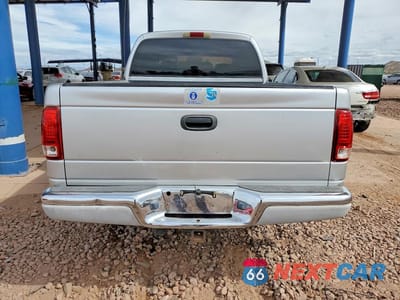 Zdjęcie 6 z 12 samochodu: 2003 DODGE DAKOTA QUAD SLT VIN:1D7HL48N43S133988 - miniatura