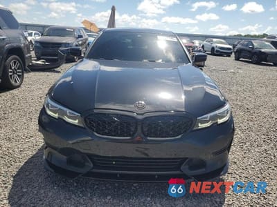 Piąte zdjęcie samochodu w środku: 2022 BMW 330I VIN:3MW5R1J04N8C48567 - miniatura