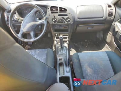 Zdjęcie 8 z 12 samochodu: 1999 MITSUBISHI MIRAGE DE VIN:JA3AY11A0XU034516 - miniatura