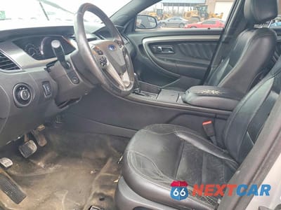 Zdjęcie 7 z 11 samochodu: 2016 FORD TAURUS SEL VIN:1FAHP2H87GG111706 - miniatura